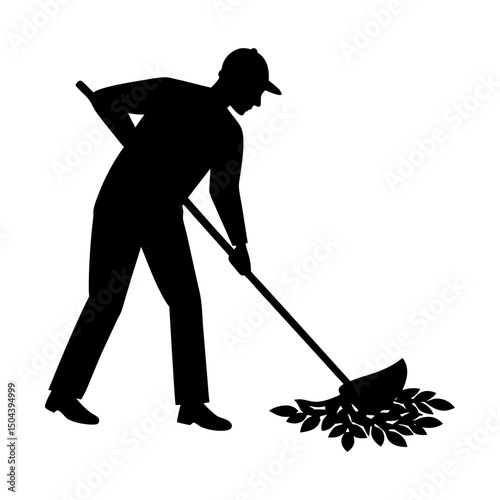 Silhouette of man raking leaves in the yard area