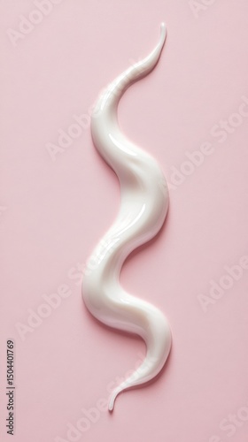 Creamy White Swirl on Pink Surface Creating a Smooth Texture and Visual Appeal