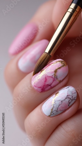 Elegant Marble Nail Art Design With Gold Accents and Precision Brush Application