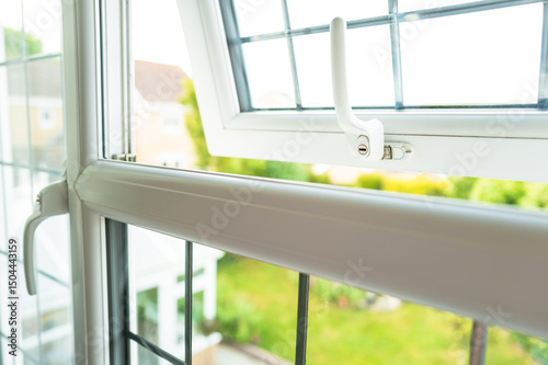 Fototapet Newly installed double glazed windows seen in a first floor bedroom in a typical home