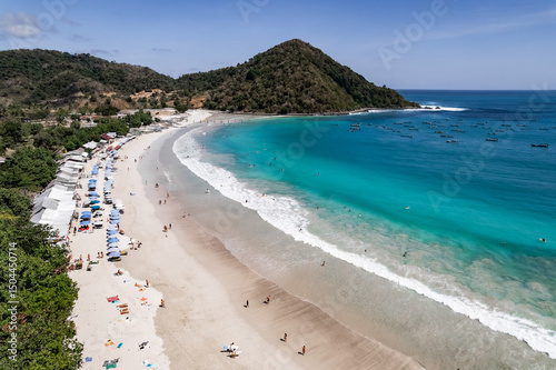 Wallpaper Mural Tourists enjoying tanjung aan beach in lombok, indonesia on sunny day Torontodigital.ca