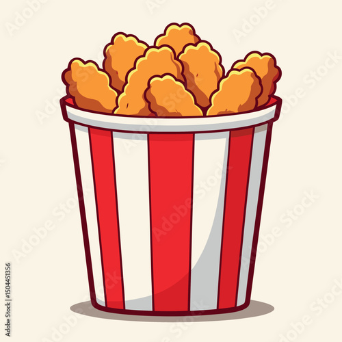 Crispy fried chicken nuggets in red striped bucket