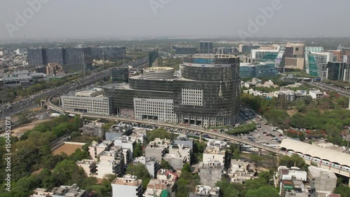 Drone Shot of DLF Cyber City Gurgaon – Aerial View of Iconic IT Hub with Glass Towers, Office Buildings, Skywalk, Metro Line, and Modern Infrastructure in Gurugram, India