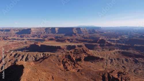 Panorama picturesque Grand Canyon in western United States in national park. Colorado river eroded channel in sandstone. View observation point for traveling tourists. Red rocks of Dead Horse Canyon