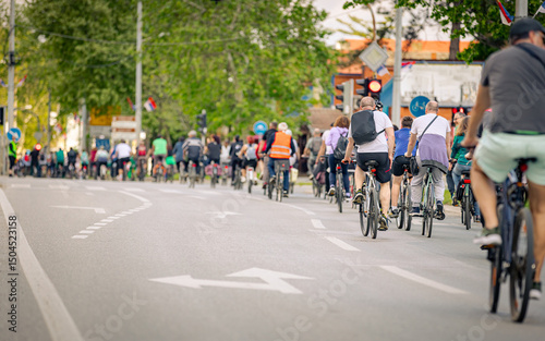 Wallpaper Mural Group of cyclists on city road, street, asphalt Torontodigital.ca