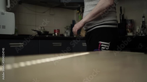 Sharpening a Kitchen Knife Under Soft Sunlight — Close-Up Culinary Blade Maintenance