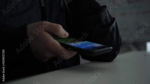 Man Scrolling Social Media on Smartphone — Mobile Browsing and Digital Engagement