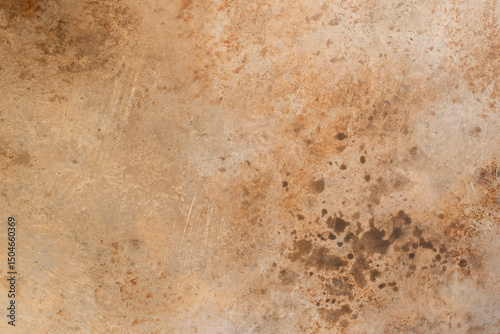 Textured rusty metal surface with brown and orange corrosion patterns