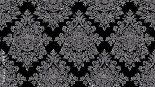 A detailed damask pattern in black and white featuring floral and leaf motifs in a symmetrical design