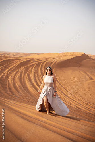 Wallpaper Mural Beautiful girls in a beautiful flowing dress in desert condition Torontodigital.ca