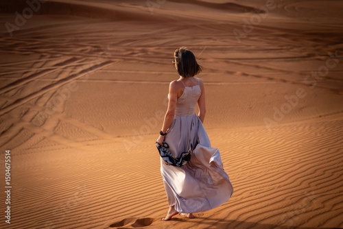 Wallpaper Mural Beautiful girls in a beautiful flowing dress in desert condition Torontodigital.ca