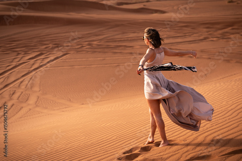 Wallpaper Mural Beautiful girls in a beautiful flowing dress in desert condition Torontodigital.ca