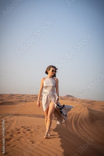 Wallpaper Mural Beautiful girls in a beautiful flowing dress in desert condition Torontodigital.ca