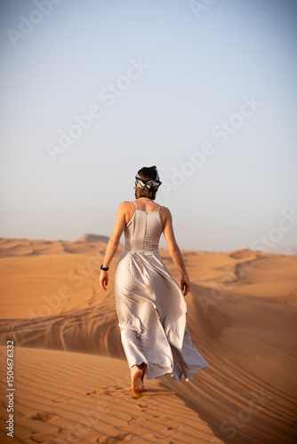 Wallpaper Mural Beautiful girls in a beautiful flowing dress in desert condition Torontodigital.ca