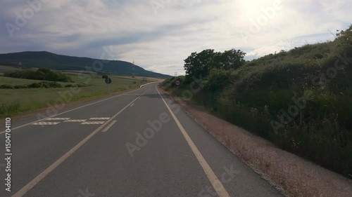 Peaceful Drive Through Sunny Natural Landscape