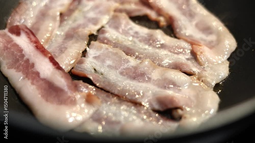 Close Up Raw Bacon Sizzles