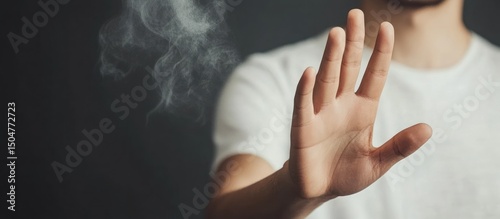 Hand gesture signifying no smoking zone, highlighting health awareness and safety