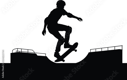 Skateboarder silhouette performing a trick at skate park