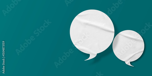 White speech bubble crumpled paper isolated on green background