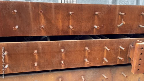 Rusty Steel Beam with Bolted Studs – Industrial Structural Component