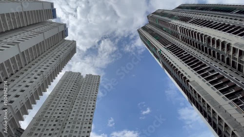 low angle shot of high rise building with blue sky background