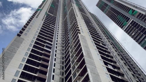 low angle shot of high rise building with blue sky background 