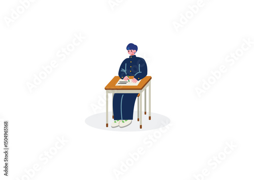 机で勉強する男子学生