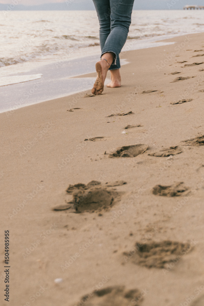 Tranquil Beach Walk Leaving Footprints in the Sand Tranquil Beach Walk Leaving Footprints in the Sand