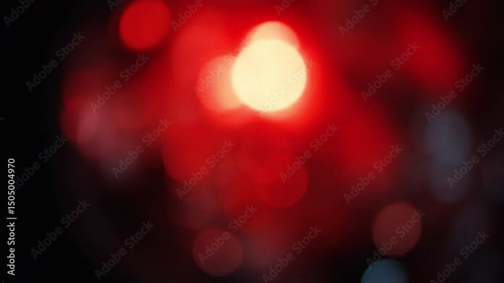 Overlay of vintage red light leaks with soft lens blur effect