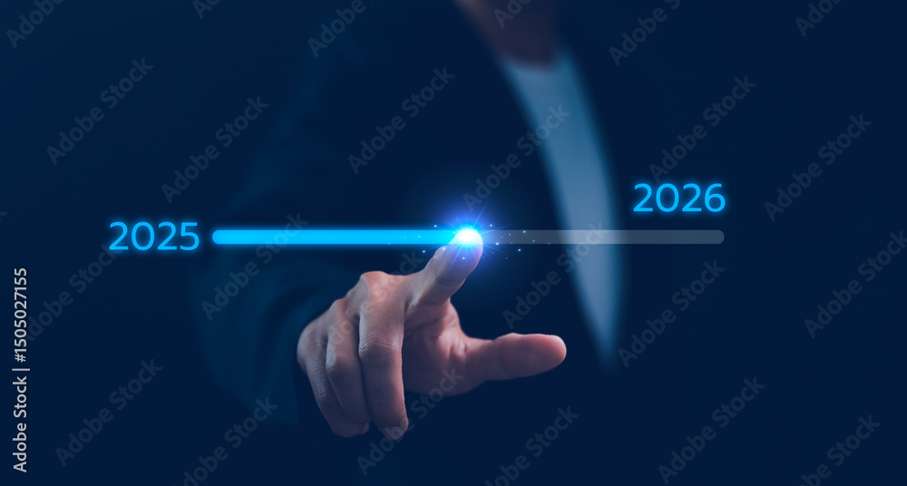 Businessman touch on loading progress from 2025 to 2026, Planning and challenge strategy in new year 2025 Concept. New business startup in 2025. 2025 is loading to 2026, calendar date, end of the year