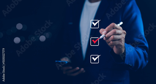 Obraz na płótnie Businessman tick correct mark to approve document iso checklist icon.checkmark quality management quality assurance or QA and quality control or QC and improvement, Standardization and certification. w salonie