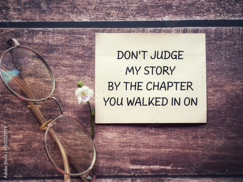 Inspirational Quote - Don't judge my story by the chapter you walked in on. Stock photo.