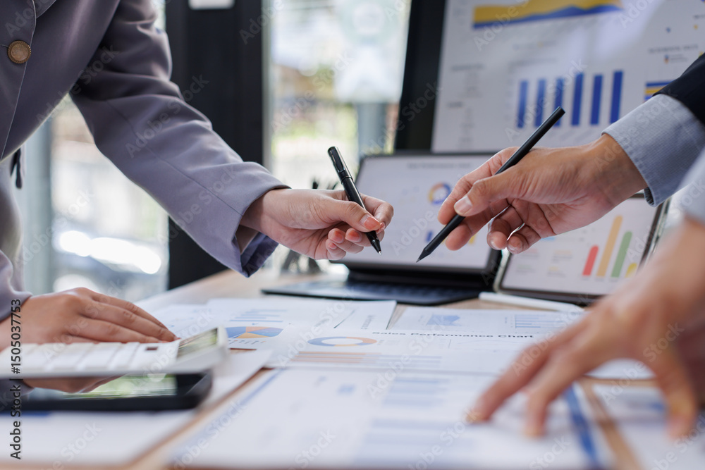 Naklejka premium Financial Business Team analyze the graph of the company's performance to create profits and growth, Market research reports and income statistics, Financial and Accounting concept. 