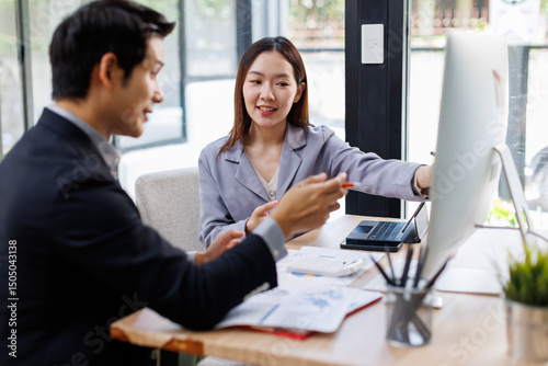Asian business Team working at office with documents on his desk, doing planning analyzing the financial report, business plan investment, finance analysis concept	