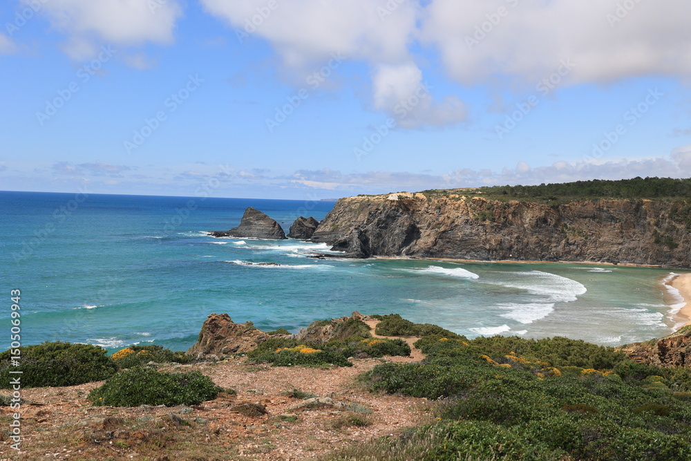 Naklejka premium View of the steep cliffs at Odeceixe beach, Algarve, Portugal