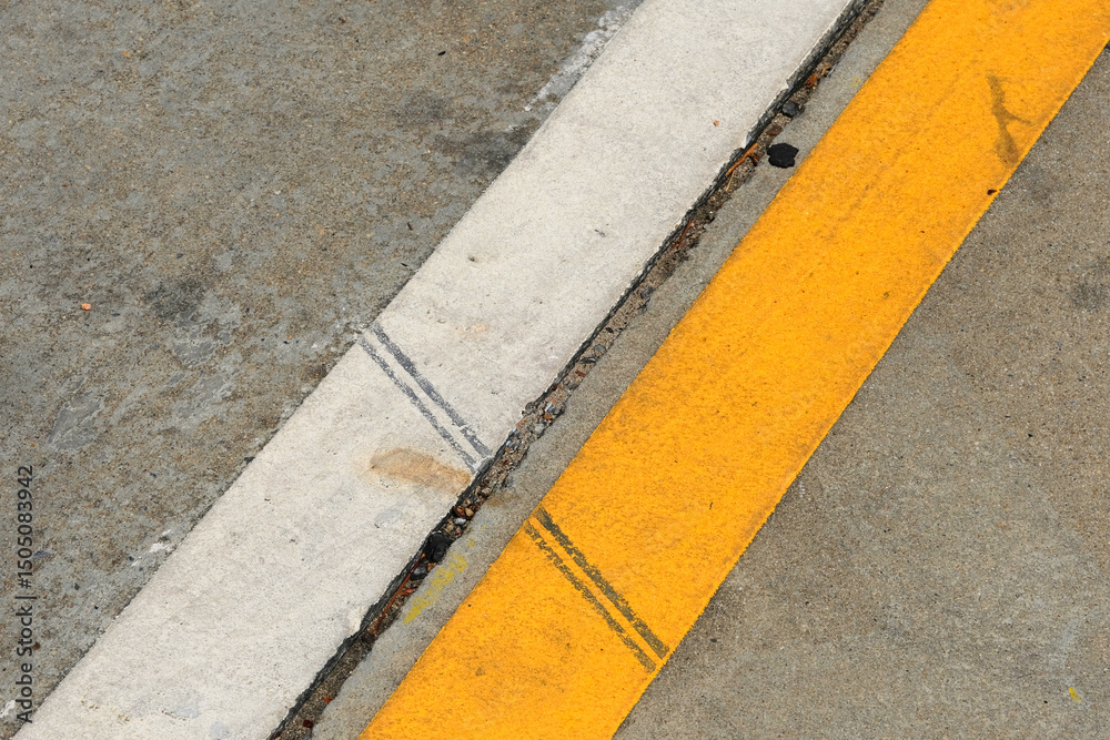 Fototapeta premium yellow line on asphalt