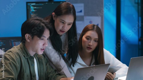 Asian AI Programmers, Software developer Team Reviewing Machine Learning Code and Editing Prompt for Ai Chatbot Development Reviewing Code and Diagrams Together working together in Office Workspace.