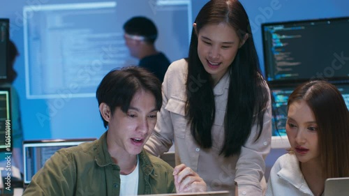 Group of male, female software developer, programmer Training Intelligent Agent, Reviewing Code, Analyzing Code and Testing and developing Custom prompt for AI project, working together in tech office