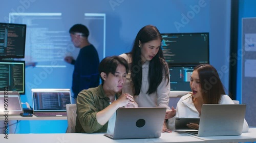 Group of male, female software developer, programmer Training Intelligent Agent, Reviewing Code, Analyzing Code and Testing and developing Custom prompt for AI project, working together in tech office