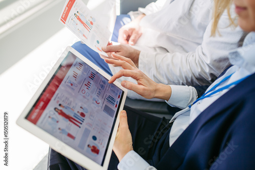 Business interaction between pharma rep and healthcare provider.