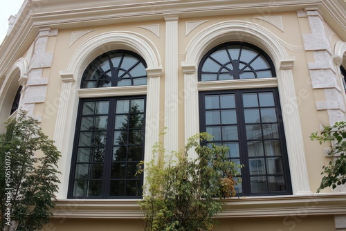 Design inspiration with arched and rectangular cream windows for stylish home facades.