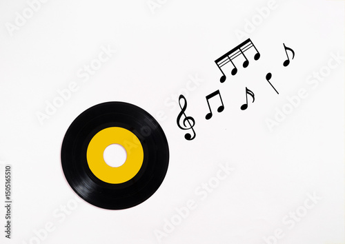 Vinyl record playing music notes on white background