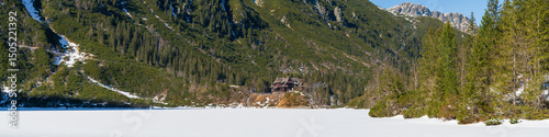 Obraz na płótnie Frozen Sea Eye lake in Tatra mountains with wooden shelter. Poland w salonie