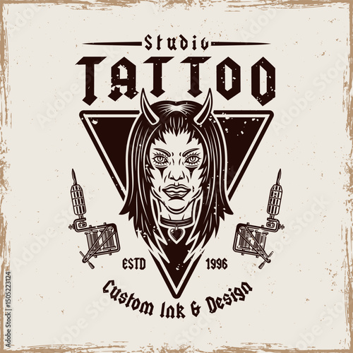 Vintage tattoo studio emblem with devil girl head and tattoo machines. Gothic, old school vector design for tattoo artists, studios, and apparel. Dark, edgy, and artistic illustration in retro style