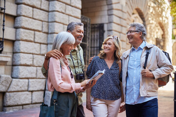 Senior tourists exploring european city