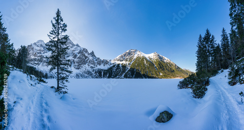 Frozen Sea Eye lake in Tatra mountains. Poland 