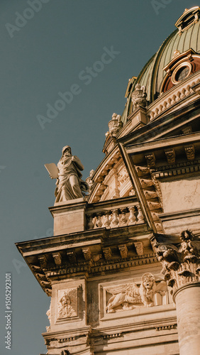 Photography Corner shop building at street intersection with pedestrian and cyclist passing