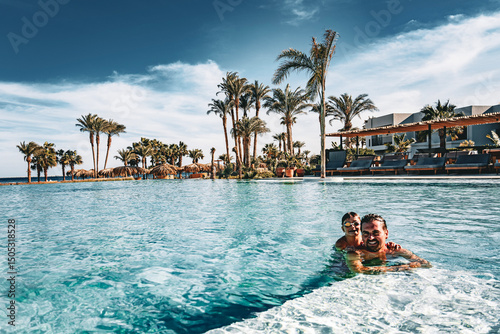 Photo from Hurghada in Egypt son and father in pool