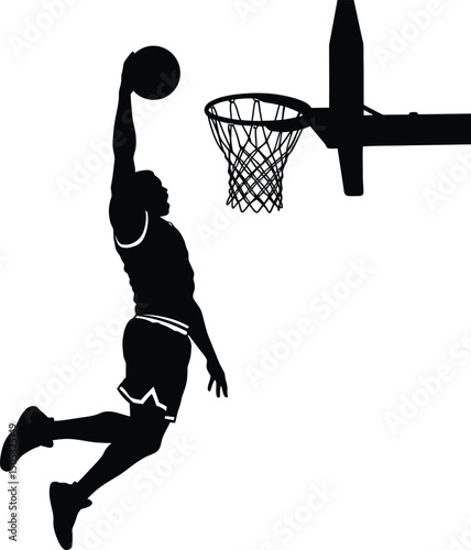 Athlete in motion dunking basketball with force and precision silhouette