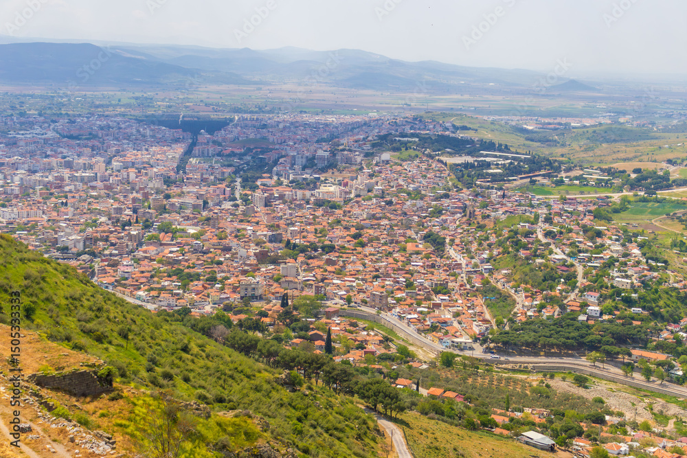 Fototapeta premium Wide angle shot of Bergama(pergamon) city center with iconic houses and Red Hall Basilica.